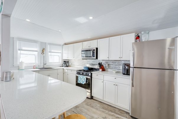 Interior, Kitchen, Recessed Lighting, Stainless Steel Appliances, Wood Texture Flooring