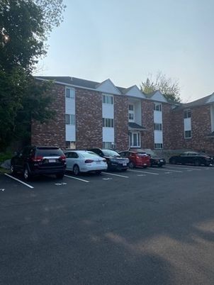 Exterior, Facade, Brick Facade, Condo Building