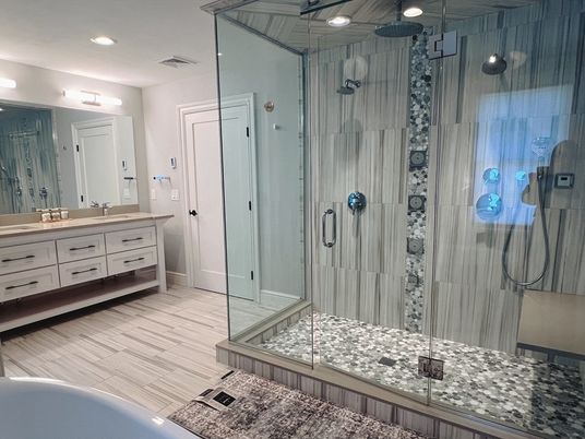 Bathroom, Dual Sink Vanities, Glass Shower, Interior, Recessed Lighting, Wood Texture Flooring