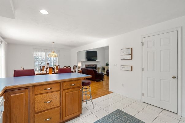 Chandelier, Dining room, Fireplace, Interior, Living room, Recessed Lighting, Wood Texture Flooring