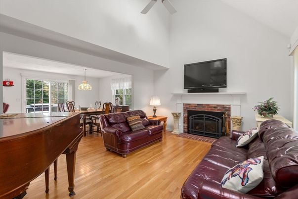 Chandelier, Dining room, Fireplace, Interior, Living room, Piano, Wood Texture Flooring