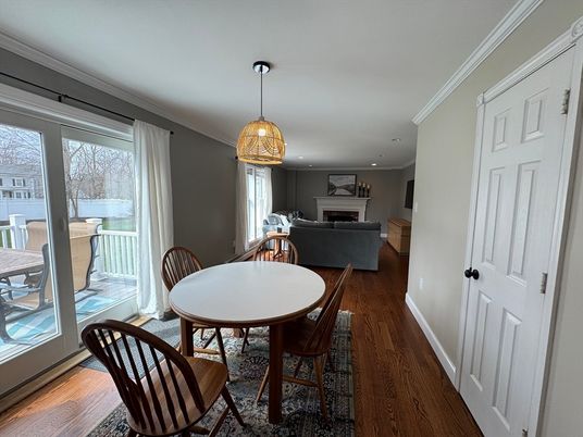 Dining room, Fireplace, Interior, Living room, Pendant Lights, Recessed Lighting, Wood Texture Flooring