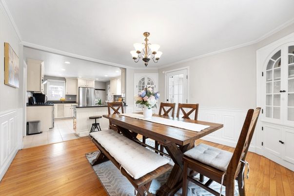 Chandelier, Dining room, Interior, Kitchen, Recessed Lighting, Stainless Steel Appliances, Wood Texture Flooring