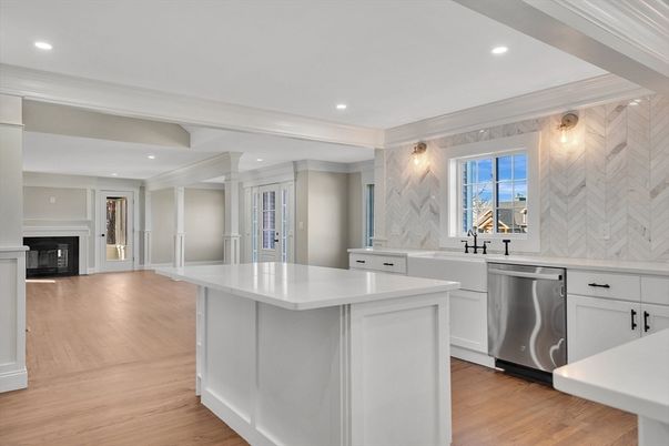 Fireplace, Interior, Kitchen, Recessed Lighting, Stainless Steel Appliances, Wood Texture Flooring