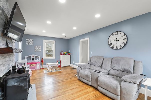 Fireplace, Interior, Living room, Recessed Lighting, Wood Texture Flooring