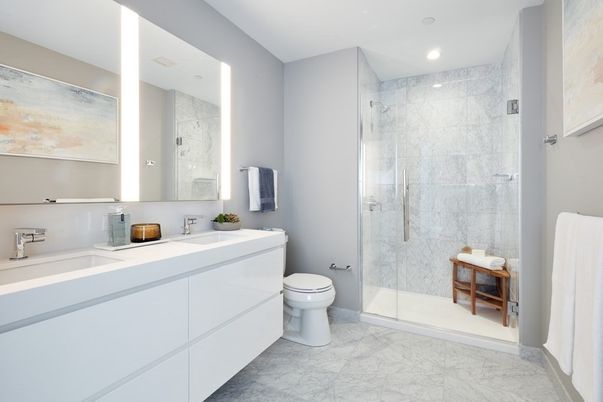Bathroom, Dual Sink Vanities, Glass Shower, Interior, Marble, Marble Walls, Recessed Lighting