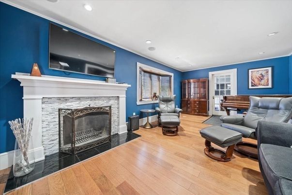 Fireplace, Interior, Living room, Piano, Recessed Lighting, Wood Texture Flooring