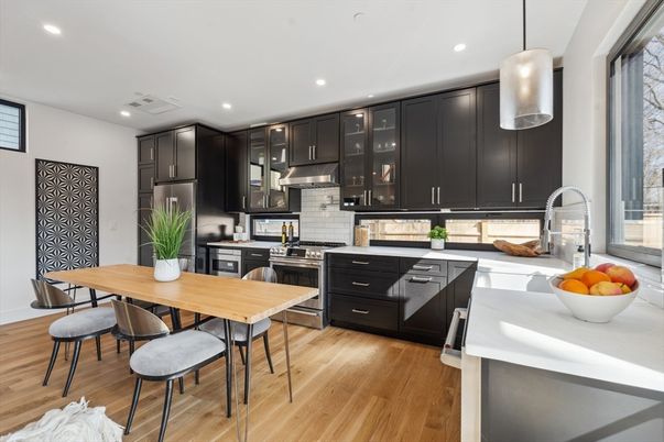 Dining room, Interior, Kitchen, Pendant Lights, Recessed Lighting, Stainless Steel Appliances, Wood Texture Flooring