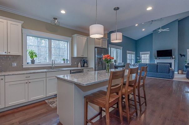 Dining room, Fireplace, Interior, Kitchen, Pendant Lights, Recessed Lighting, Stainless Steel Appliances, Wood Texture Flooring