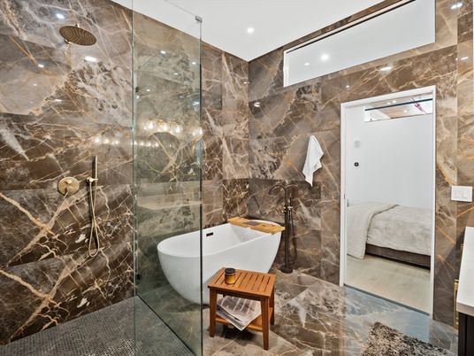 Bathroom, Free Standing Baths, Glass Shower, Interior, Marble Walls, Recessed Lighting