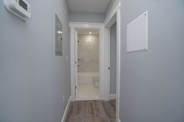 Bathroom, Interior, Marble, Marble Walls, Recessed Lighting, Wood Texture Flooring