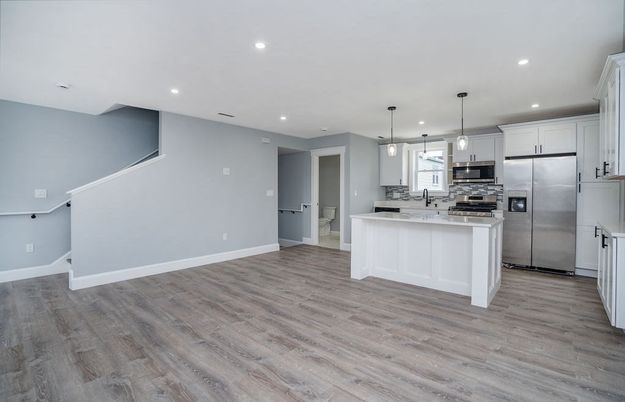 Interior, Kitchen, Pendant Lights, Recessed Lighting, Stainless Steel Appliances, Wood Texture Flooring