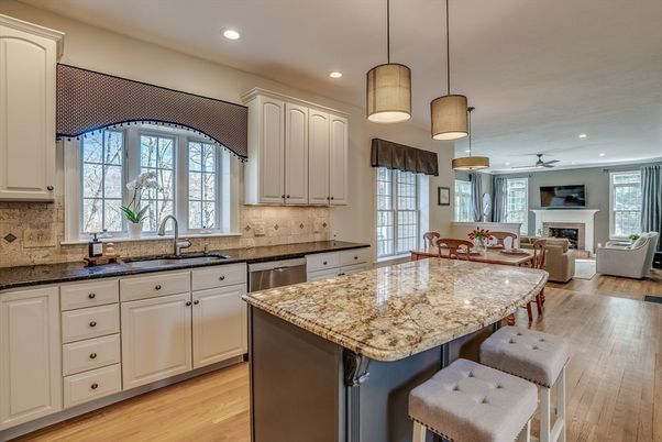 Dining room, Fireplace, Interior, Kitchen, Living room, Pendant Lights, Recessed Lighting, Stainless Steel Appliances, Wood Texture Flooring