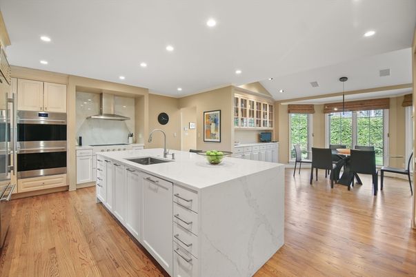 Dining room, Interior, Kitchen, Pendant Lights, Recessed Lighting, Stainless Steel Appliances, Wood Texture Flooring