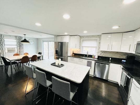 Dining room, Interior, Kitchen, Pendant Lights, Recessed Lighting, Stainless Steel Appliances, Wood Texture Flooring
