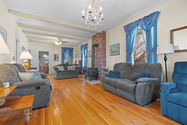 Chandelier, Fireplace, Interior, Living room, Stone Walls, Wood Texture Flooring