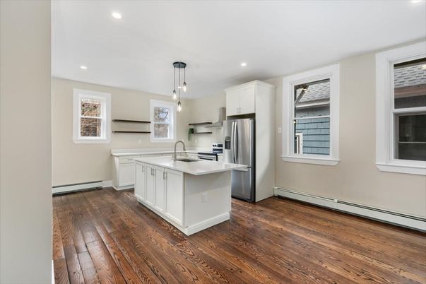 Interior, Kitchen, Pendant Lights, Recessed Lighting, Stainless Steel Appliances, Wood Texture Flooring