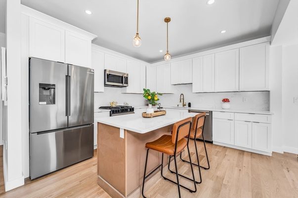 Interior, Kitchen, Pendant Lights, Recessed Lighting, Stainless Steel Appliances, Wood Texture Flooring