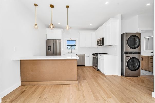 Interior, Kitchen, Pendant Lights, Recessed Lighting, Stainless Steel Appliances, Washer, Wood Texture Flooring
