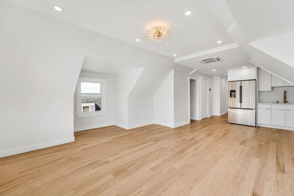 Chandelier, Empty room, Interior, Kitchen, Recessed Lighting, Stainless Steel Appliances, Wood Texture Flooring
