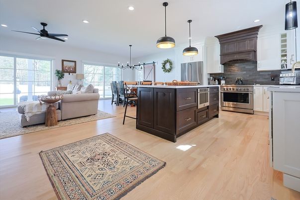 Dining room, Interior, Kitchen, Living room, Pendant Lights, Recessed Lighting, Stainless Steel Appliances, Wood Texture Flooring