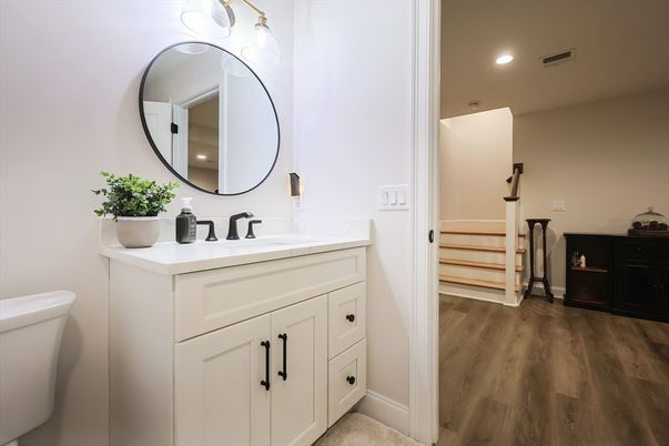 Bathroom, Dual Sink Vanities, Interior, Recessed Lighting, Wood Texture Flooring