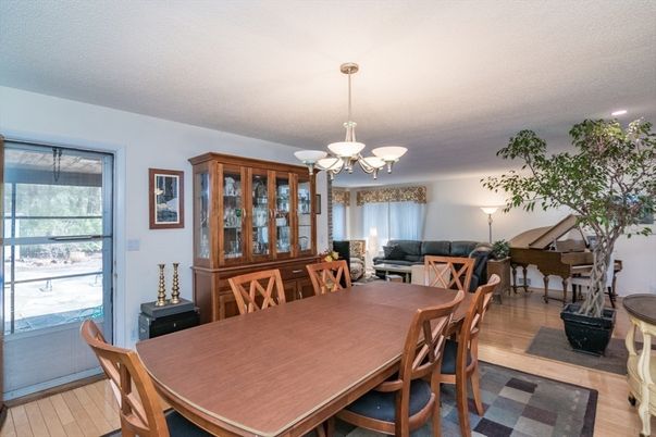 Chandelier, Dining room, Interior, Living room, Piano, Wood Texture Flooring