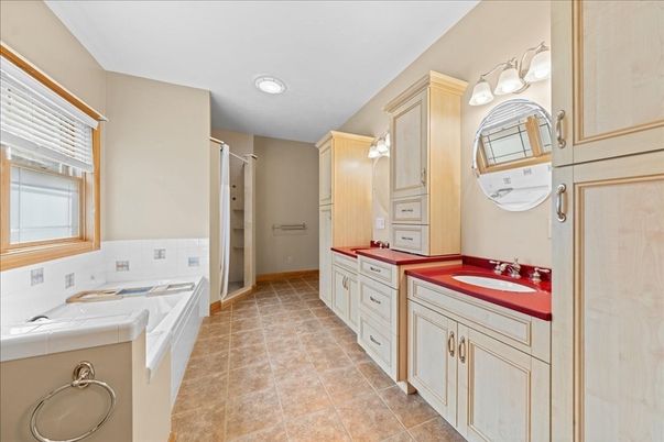 Bathroom, Dual Sink Vanities, Interior, Recessed Lighting, Tile Countertops, Washer