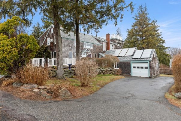 Attached, Exterior, Facade, Solar Panels, Tudor Revival
