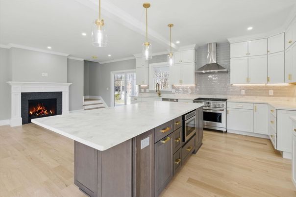 Fireplace, Interior, Kitchen, Pendant Lights, Recessed Lighting, Stainless Steel Appliances, Wood Texture Flooring