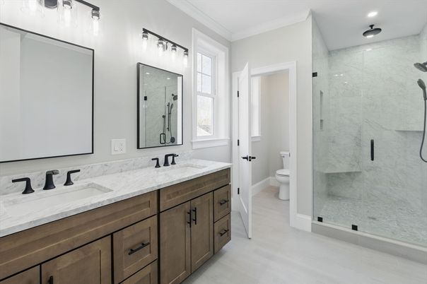 Bathroom, Dual Sink Vanities, Glass Shower, Interior, Marble Walls, Recessed Lighting