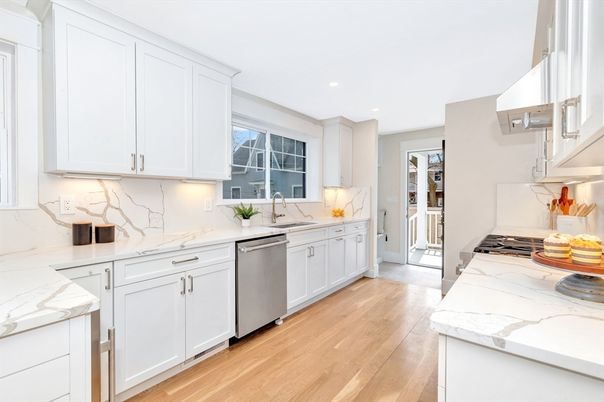 Interior, Kitchen, Marble Walls, Recessed Lighting, Stainless Steel Appliances, Wood Texture Flooring