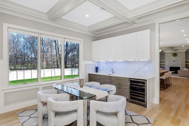 Dining room, Fireplace, Interior, Living room, Marble Walls, Recessed Lighting, Wood Texture Flooring