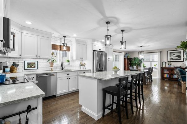 Dining room, Interior, Kitchen, Pendant Lights, Recessed Lighting, Stainless Steel Appliances, Wood Texture Flooring