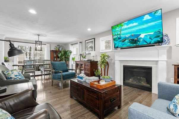 Dining room, Fireplace, Interior, Living room, Pendant Lights, Recessed Lighting, Wood Texture Flooring