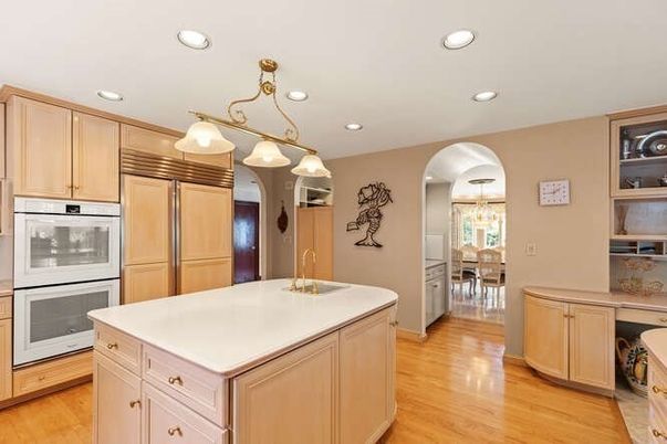 Chandelier, Dining room, Interior, Kitchen, Recessed Lighting, Stainless Steel Appliances, Wood Texture Flooring