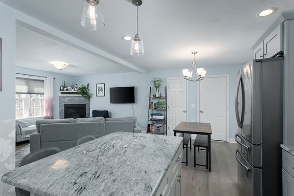 Chandelier, Dining room, Fireplace, Interior, Kitchen, Living room, Pendant Lights, Recessed Lighting, Wood Texture Flooring