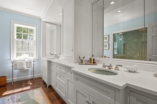 Bathroom, Dual Sink Vanities, Glass Shower, Interior, Recessed Lighting, Wood Texture Flooring