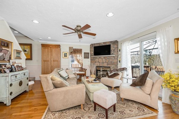Fireplace, Interior, Living room, Recessed Lighting, Stone Walls, Wood Texture Flooring