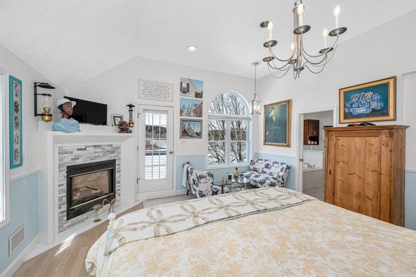 Bedroom, Chandelier, Fireplace, Interior, Pendant Lights, Recessed Lighting, Wood Texture Flooring