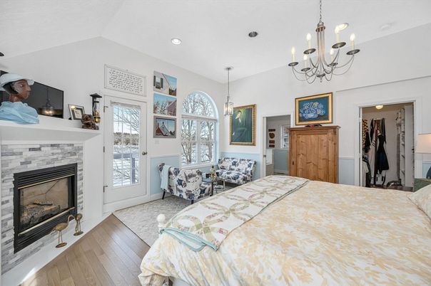 Bedroom, Chandelier, Fireplace, Interior, Pendant Lights, Recessed Lighting, Wood Texture Flooring