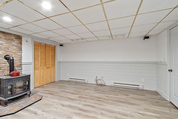 Empty room, Interior, Recessed Lighting, Stone Walls, Wood Texture Flooring