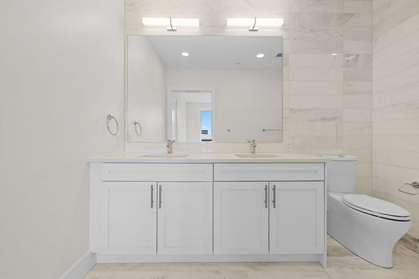 Bathroom, Dual Sink Vanities, Interior, Marble, Marble Walls, Recessed Lighting