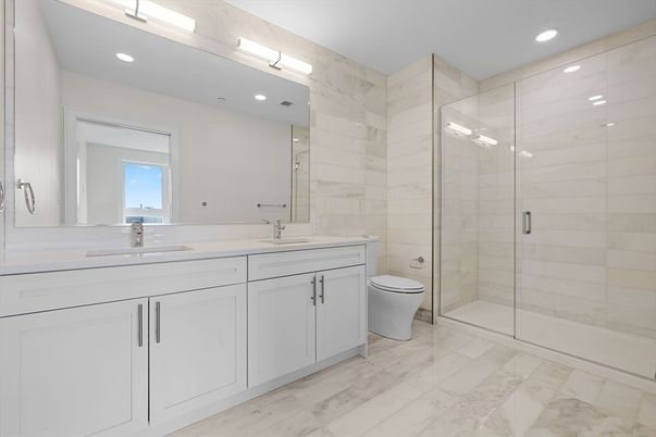 Bathroom, Dual Sink Vanities, Glass Shower, Interior, Marble, Marble Walls, Recessed Lighting