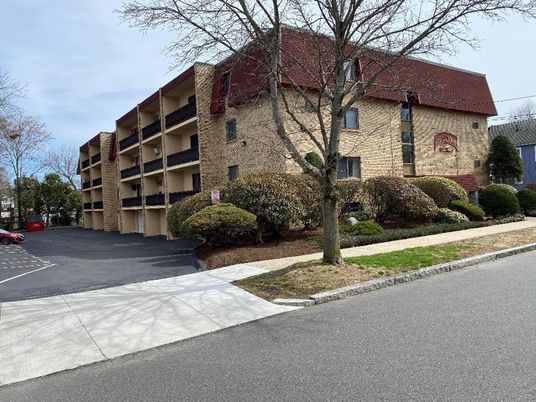 Exterior, Facade, Brick Facade, Condo Building