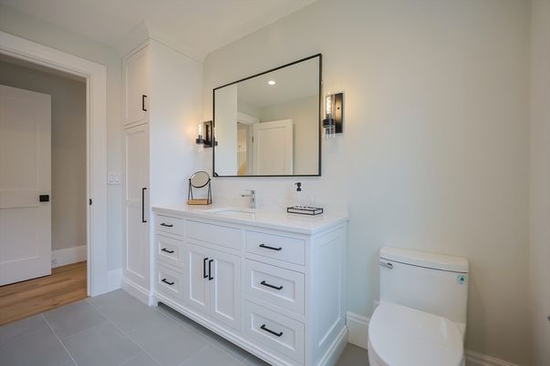 Bathroom, Dual Sink Vanities, Interior, Recessed Lighting, Wood Texture Flooring