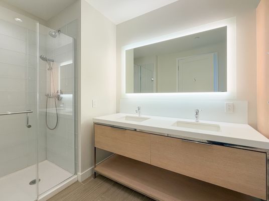 Bathroom, Dual Sink Vanities, Glass Shower, Interior, Wood Texture Flooring