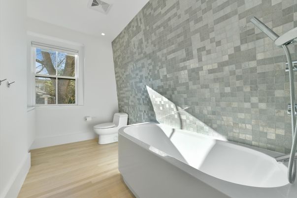 Bathroom, Free Standing Baths, Glass Shower, Interior, Recessed Lighting, Wood Texture Flooring