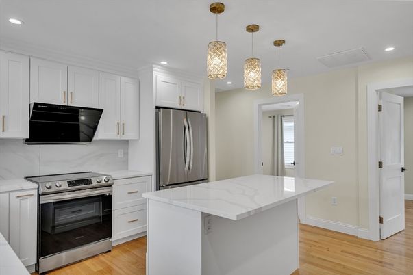 Interior, Kitchen, Pendant Lights, Recessed Lighting, Stainless Steel Appliances, Wood Texture Flooring