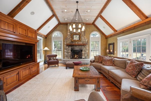 Fireplace, Interior, Living room, Pendant Lights, Recessed Lighting, Stone Walls, Wooden Beams, Wood Texture Flooring